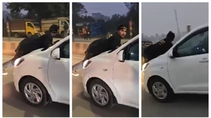 'മൊറാദാബാദ്, കളി കാണാനിരിക്കുന്നതേയുള്ളൂ'; തിരക്കേറിയ റോഡിലൂടെ പോകുന്ന കാറിന്‍റെ ബോണറ്റിൽ ഒരാൾ, വീഡിയോ വൈറൽ 