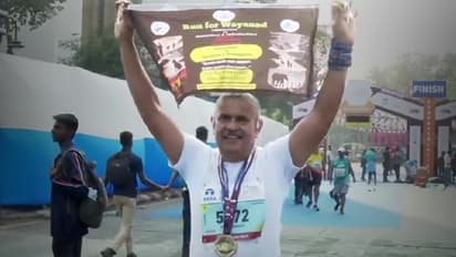 വയനാടിന് വേണ്ടി മുംബൈ മാരത്തണിൽ പങ്കെടുത്ത് കിഫ്ബി സി.ഇ.ഒ കെ.എം. എബ്രഹാം