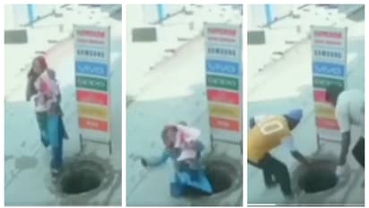 ഞെട്ടിക്കുന്ന വീഡിയോ; കൈകുഞ്ഞുമായി ഫോണില്‍ സംസാരിച്ച് പോകവെ യുവതി മാന്‍ഹോളിലേക്ക് വീണു, ഓടിക്കൂടി നാട്ടുകാർ 