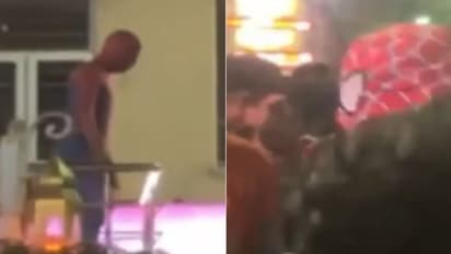 കെട്ടിടങ്ങളിലും കാറുകൾക്കും മുകളിൽ ഓടിക്കയറി 'സ്പൈഡർമാൻ', ഗതാഗതക്കുരുക്ക് രൂക്ഷമായതോടെ പൊലീസ് പിടിയിൽ