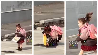 അവൾ കുട്ടിക്കാലം അർഹിക്കുന്നു; ഹോംവർക്ക് ബുക്ക് ഓടയിലേക്കിട്ട് തുള്ളിച്ചാടി പോകുന്ന കുട്ടിയുടെ വീഡിയോ വൈറൽ