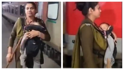 ഒരു കയ്യിൽ ലാത്തി, നെഞ്ചോട് ചേർത്ത് കൈക്കുഞ്ഞ്; 'പോരാളി'യെന്ന് സോഷ്യൽ മീഡിയ, ആർപിഎഫ് ഉദ്യോഗസ്ഥക്ക് കയ്യടി  