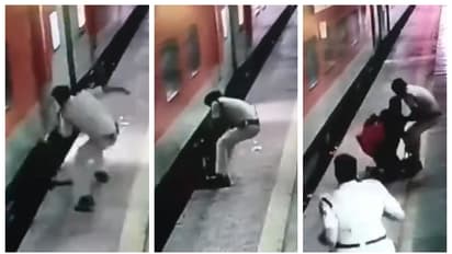 ഓടിത്തുടങ്ങിയ ട്രെയിനിൽ കയറാനുള്ള ശ്രമത്തിനിടെ പിടിവിട്ടു, നേരെ ട്രാക്കിലേക്ക്;  അത്ഭുതകരമായ രക്ഷപ്പെടൽ വീഡിയോ