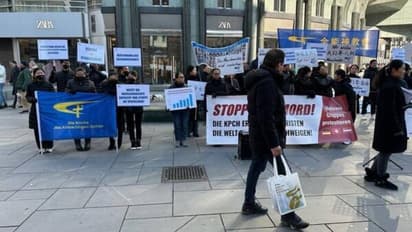 Chinese diaspora in Austria hold protest against ongoing religious persecution in China, demand global action