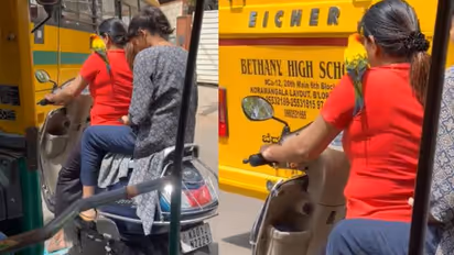 ചുമലിൽ തത്ത, രണ്ടാൾക്കും ഹെൽമെറ്റില്ല; കൗതുകവുമായി ബെം​ഗളൂരുവിൽ നിന്നുള്ള വീഡിയോ 