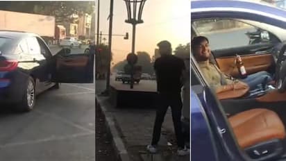 ബിഎംഡബ്ല്യു റോഡിന്റെ നടുക്ക് നിർത്തി ഡോർ തുറന്നിട്ടു, സിഗ്നലിൽ മൂത്രമൊഴിച്ച് യുവാവ്; വീഡിയോ എടുത്തപ്പോൾ ചിരി