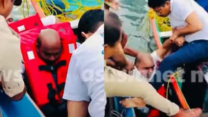 എം ലിജുവും ഡിസിസി പ്രസിഡന്‍റ്  ബി ബാബു പ്രസാദും കടലിൽ വീണു; ദൃശ്യങ്ങൾ പുറത്ത്