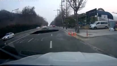 Seoul: Dashcam video captures moment motorcyclist falls in sinkhole, found dead after 17-hour search (WATCH)
