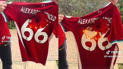 Liverpool fan burns Trent Alexander-Arnold jersey as Real Madrid transfer rumours intensify (WATCH)
