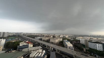 Relief from heat, roads flooded as Bengaluru sees heavy rain, strong winds; netizens share videos (WATCH)