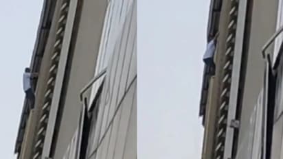 Delhi: Man seen dangling from Mayur Vihar metro station, jumps, hospitalised in critical condition (WATCH)