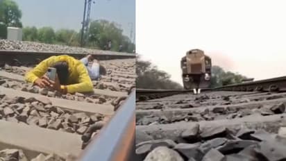 റെയിൽവേ പാളത്തിൽ മൊബൈലുമായി യുവാവ്, ട്രെയിൻ വരുന്നത് കണ്ടിട്ടും ട്രാക്കിൽ തന്നെ കിടന്നു, അറസ്റ്റിൽ 