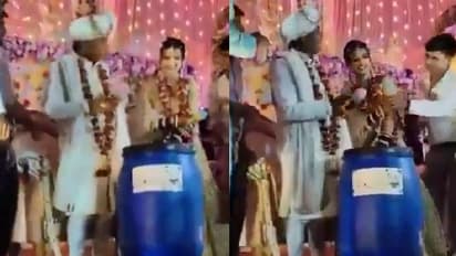 കൂട്ടുകാരുടെ സമ്മാനം നീല ഡ്രം, ഞെട്ടിപ്പകച്ച് വരൻ, ചിരിയടക്കാനാവാതെ വധു, അല്പം കടുത്തുപോയെന്ന് നെറ്റിസൺസ്