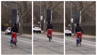 ന്യൂയോര്‍ക്ക് സിറ്റിയിലൂടെ തലയില്‍ ഫ്രിഡ്ജും ചുമന്ന് സൈക്കിൾ ചവിട്ടുന്ന യുവാവ്; വീഡിയോ വൈറൽ 