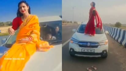 കാറിന്റെ ബോണറ്റിൽ ഡാൻസ്, ഭർത്താവ് വാഹനമോടിക്കേ മടിയിൽ കിടന്നു; പിഴ 22,500 രൂപ