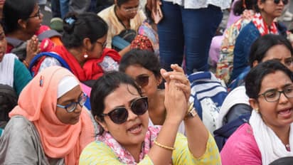 Teachers stage a sit-in protest outside SSC office