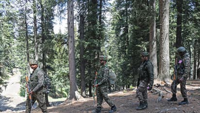 Security personnel carry out a search operation at Baisaran following the Pahalgam terrorist attack