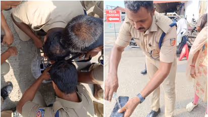 റോഡിലൂടെ നടക്കുമ്പോൾ കൈയിലിരുന്ന ഐഫോൺ ഓടയിൽ വീണു; എടുക്കാൻ കഴിയാതെ വന്നപ്പോൾ ഒടുവിൽ ഫയർഫോഴ്സെത്തി