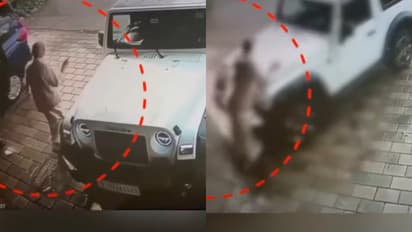 കാർ കഴുകി, നിരക്കിനെ ചൊല്ലി തർക്കം; പിന്നാലെ ചാടിക്കയറി സർവീസ് സ്റ്റേഷൻ ഉടമയെ വണ്ടി ഇടിപ്പിച്ച് യുവാവ്