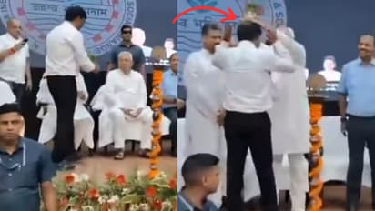 cm nitish kumar puts plant on officer head bihar patna video viral