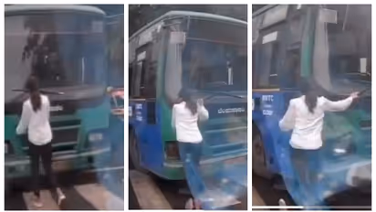 കാറിൽ ഇടിച്ച ബസിന് മുന്നില്‍ നിന്ന് പ്രതിഷേധിച്ച യുവതിയെ ഇടിച്ചിടാന്‍ ശ്രമിച്ച് ഡ്രൈവര്‍; വീഡിയോ വൈറല്‍