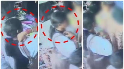 പിറകിൽ നിന്ന് മാറാതെ യുവതി, അമ്മയ്ക്കൊപ്പം സാധനം വാങ്ങാനെത്തിയ കൈ കുഞ്ഞിന്റെ സ്വർണമാല കവർന്നു, സിസിടിവി വീഡിയോ