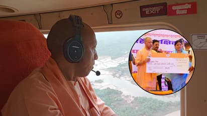 up flood relief auraiya cm yogi distributes aid