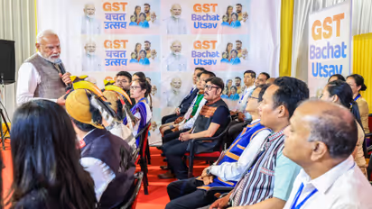 PM Narendra Modi interacts with local retailers and traders upon his visit to an exhibition.