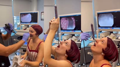 woman swallows sword