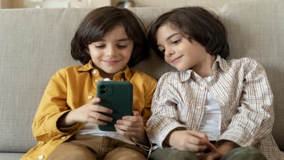 A child using tablet safely under parental guidance