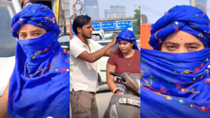 girl was tying a scarf 