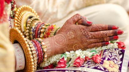 Soldiers walking the bride down the aisle