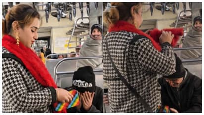 Transgender woman gives money to man