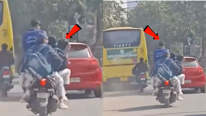 Ghaziabad Viral Video School Students Riding Overloaded Scooter Sparks Safety Debate