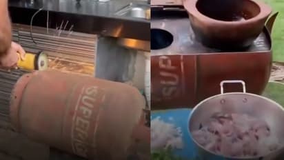 देसी जुगाड़! शख्स ने पुराने LPG सिलेंडर को काटकर बना दिया चूल्हा, Video देख लोग हैरान