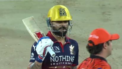 Virat Kohli and Travis Head