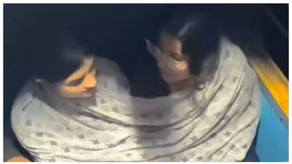 Women filmed from the top berth of the train
