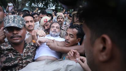 rahul gandhi dragged by police video pm residence protest detained
