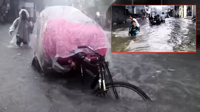 Delhi Rain Heavy Downpour Triggers Waterlogging IMD Issues Red Alert Across the Capital