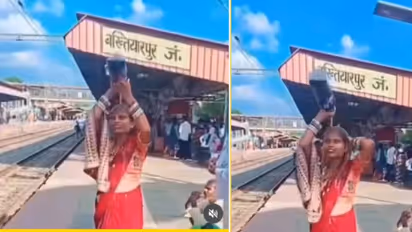 Viral Video: रील्सच्या नादात महिलेने रेल्वे प्लॅटफॉर्मवरच केली कोल्ड ड्रिंकने आंघोळ!