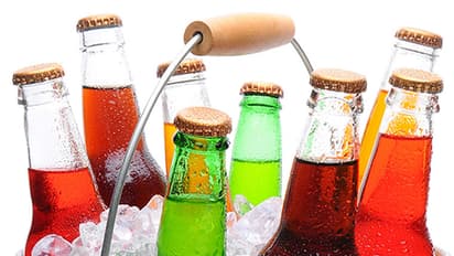 How soft drinks are a critical link between obesity and tooth wear?