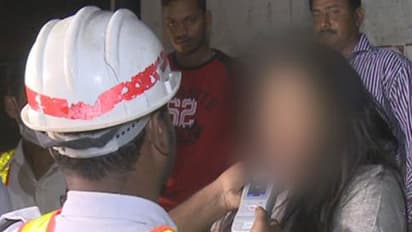 మద్యం సేవించి కారు డ్రైవింగ్.... పోలీసు పై మహిళ వీరంగం