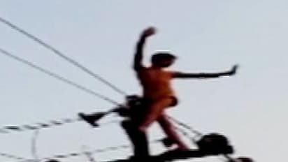 VIDEO: Man climbs electric pole for repair, what happened next is a miracle!