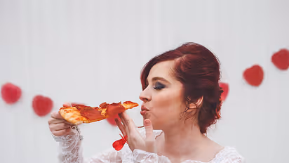 Woman marries pizza, because love