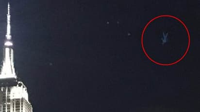 Shocking: Is that a man falling from the sky?