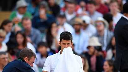 വിംബിൾഡണിൽ വൻ മരങ്ങൾ കടപുഴകുന്നു; ജോക്കോവിച്ചും,മുറെയും പുറത്ത്