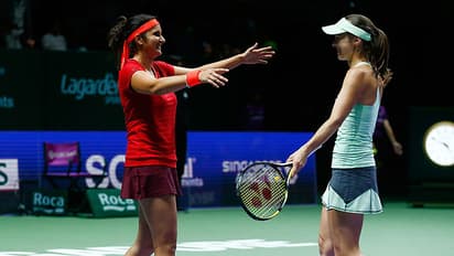 Sania Mirza, Martina Hingis walk into semis of WTA Finals