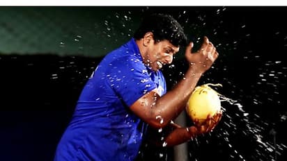 Kerala man smashes coconuts with hands; sets record