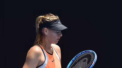 Sharapova's ban cut to 15 months; will return to action in April