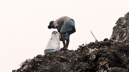 50-foot garbage heap buries woman, daughter